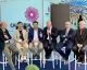 Sei relatori seduti su sgabelli durante un panel sul ruolo dei marina e la Blue Economy, sfondo con logo Calabria